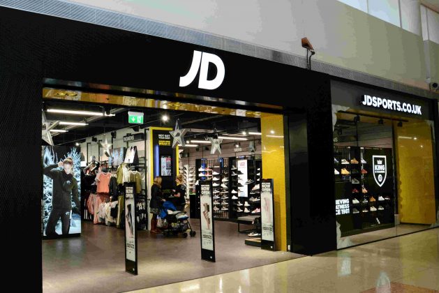 JD Sports raises profit forecast but warns stores 