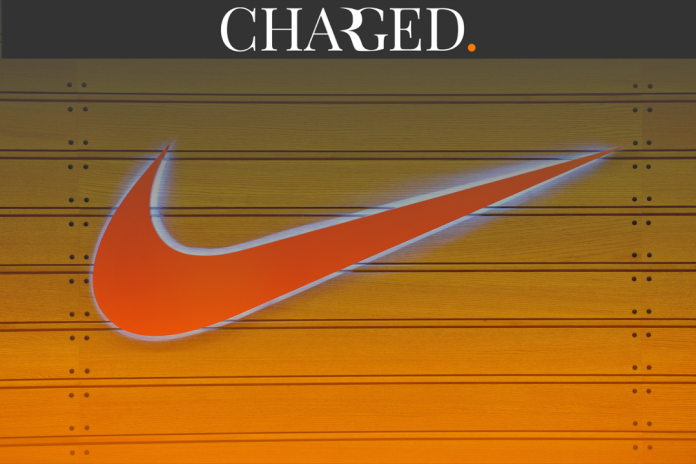orange background nike logo